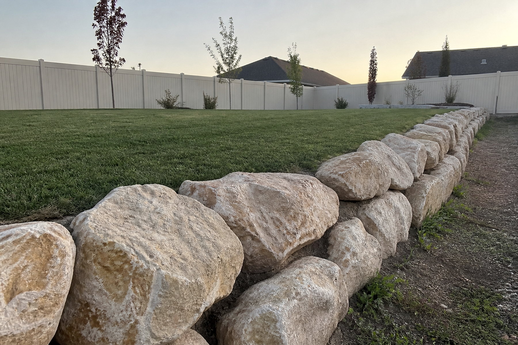 Block retaining wall construction in progress in Utah