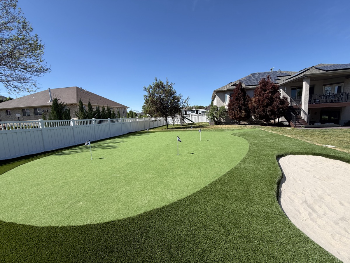 Backyard putting green with sand bunker installation in Utah
