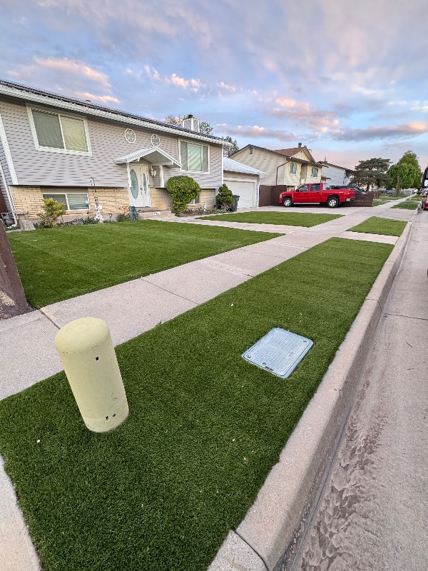 Artificial turf front yard from street view — Sol Scapes Utah